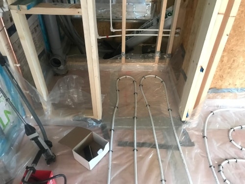 under floor heating starting to be installed